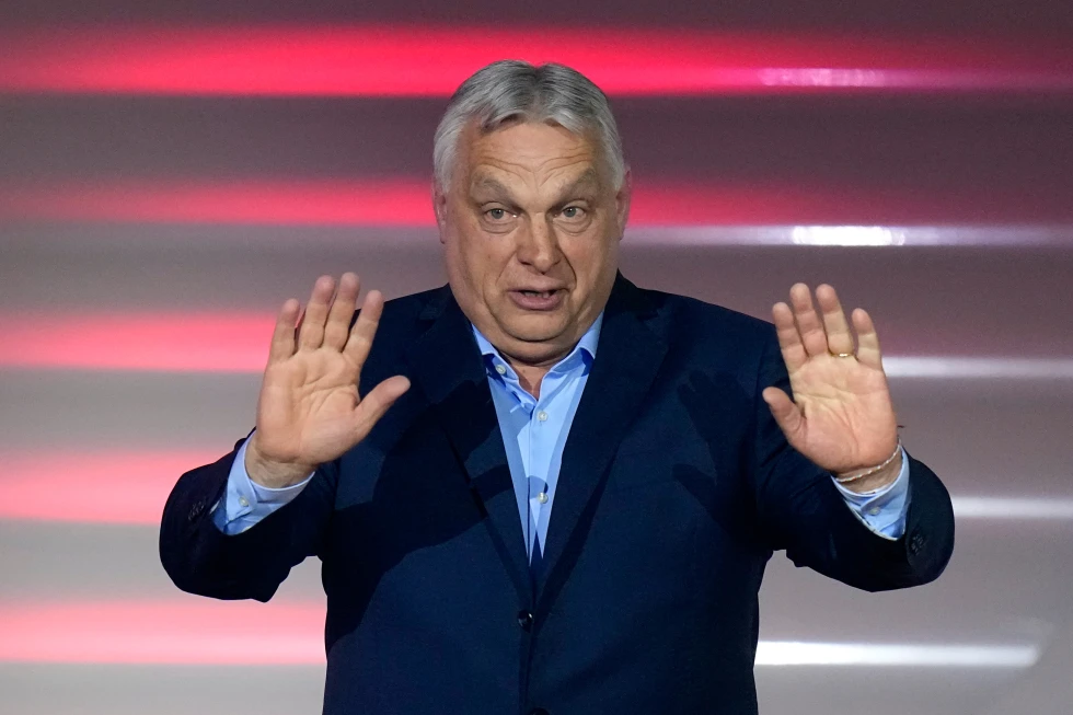 (Hungary’s Prime Minister Viktor Orban addresses supporters after receiving the results of a parliamentary election in Budapest, Hungary, Sunday, April 12, 2026. (AP Photo/Petr David Josek)