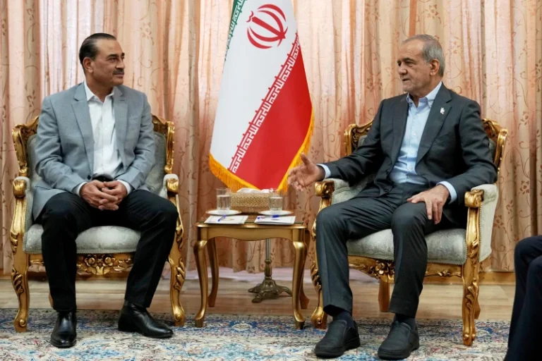 (In this photo released by the Iranian Presidency Office, President Masoud Pezeshkian, right, speaks with Pakistan’s Army Chief Field Marshal Gen. Asim Munir in Tehran, Iran, Saturday, May 23, 2026. (Iranian Presidency Office via AP)
