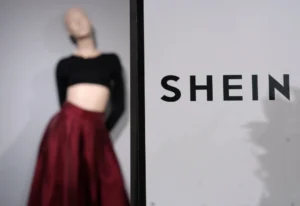 (Clothes by Chinese company Shein are seen in the BHV (Bazar de l’Hotel de Ville) department store, Tuesday, Nov. 4, 2025 in Paris. (AP Photo: Aurelien Morissard, File)