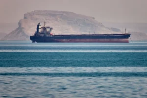 A bulk cargo ship sits at anchor in the Strait of Hormuz off Bandar Abbas, Iran, Saturday, May 2, 2026.(Amirhosein Khorgooi/ISNA via AP)