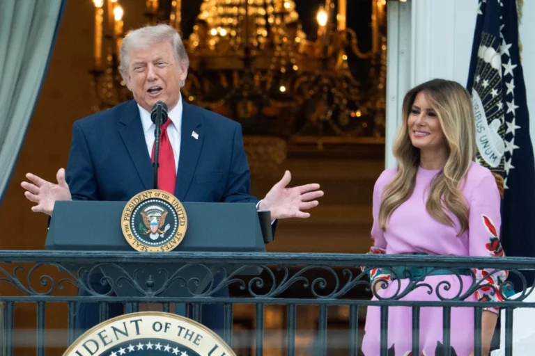 (President Donald Trump with first lady Melania Trump addresses the attendees from the Blue Room Balcony of the White House during the annual Congressional Picnic on the South Lawn, Tuesday, May 19, 2026, in Washington. (AP Photo: Manuel Balce Ceneta)
