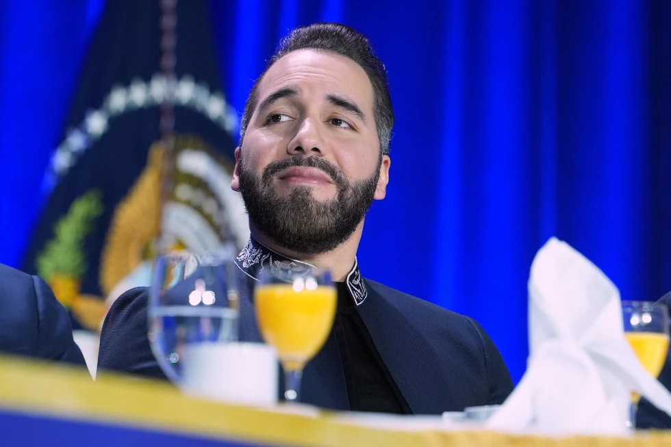 (President of El Salvador, Nayib Armando Bukele Ortez, listens as President Donald Trump speaks during the National Prayer Breakfast, Feb. 5, 2026, in Washington. (AP Photo/Evan Vucci, File)