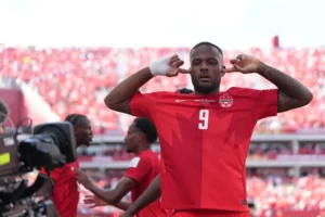 (Canada’s Cyle Larin (9) celebrates after scoring his sides first goal of the game in the second half of the World Cup Group B soccer match between Canada and Bosnia, Friday, June 12, 2026, in Toronto.  AP Photo: Sam Balkansky)