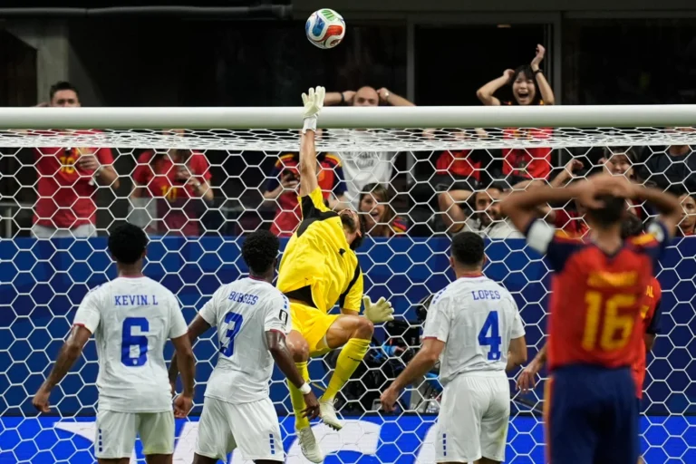 (Cape Verde goalkeeper Vozinha (1) makes a save during the World Cup Group H soccer match between Spain and Cape Verde in Atlanta, Monday, June 15, 2026.  AP Photo: Mike Stewart)