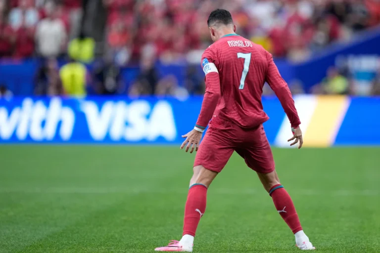 (Cristiano Ronaldo of Portugal celebrates scoring his team's first goal during the World Cup match against Uzbekistan in Houston on Tuesday.
Photo: AP)