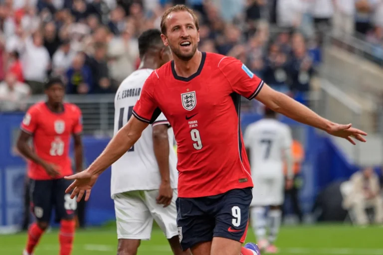 (England’s Harry Kane (9) celebrates after scoring their second goal during the World Cup Group L soccer match between Panama and England in East Rutherford, N.J., near New York, Saturday, June 27, 2026.  AP Photo: Steve Luciano)