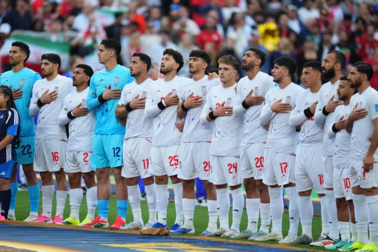 (Iran’s team stands for their national anthem during the World Cup Group G soccer match between Egypt and Iran in Seattle, Friday, June 26, 2026.  AP Photo: Manu Fernandez)