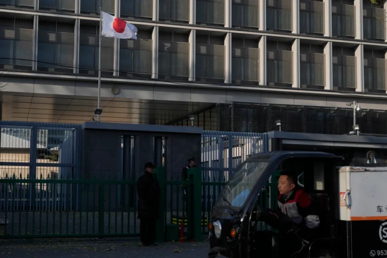 (A delivery man drives past the Japanese Embassy in Beijing on Nov. 24, 2025.  AP Photo: Ng Han Guan)