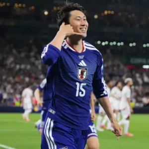 (Japan’s Daich Daichi Kamada celebrates after scoring during a 4-0 win over Tunisia in a World Cup Group F match Saturday in Mexico.  AP Photo: Matias Delacroix)