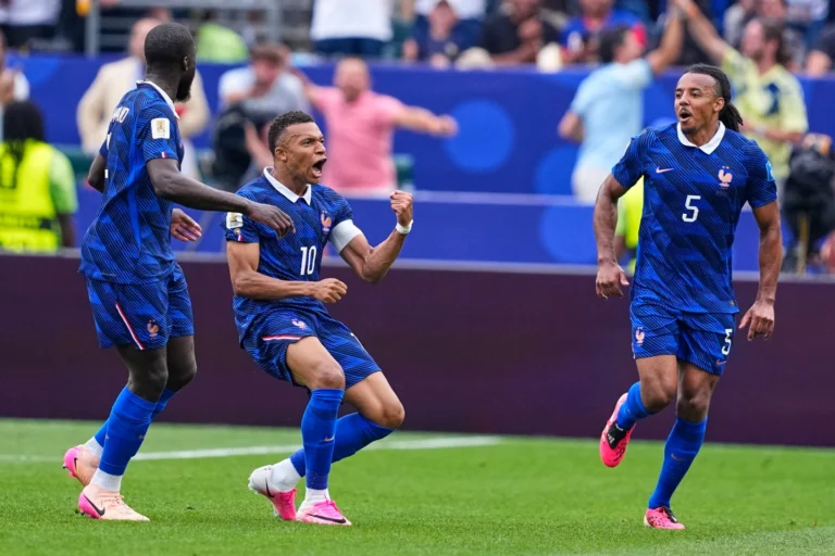 (France's Kylian Mbappe (10) celebrates after scoring his team's first goal during the World Cup Group I soccer match between France and Iraq in Philadelphia, Monday, June 22, 2026.  AP Photo: Petr David Josek)