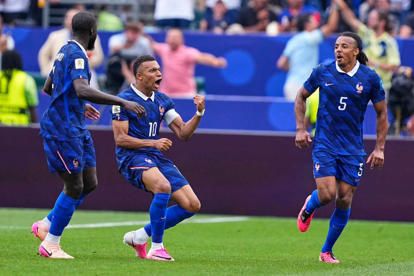 (France's Kylian Mbappe (10) celebrates after scoring his team's first goal during the World Cup Group I soccer match between France and Iraq in Philadelphia, Monday, June 22, 2026.  AP Photo: Petr David Josek)