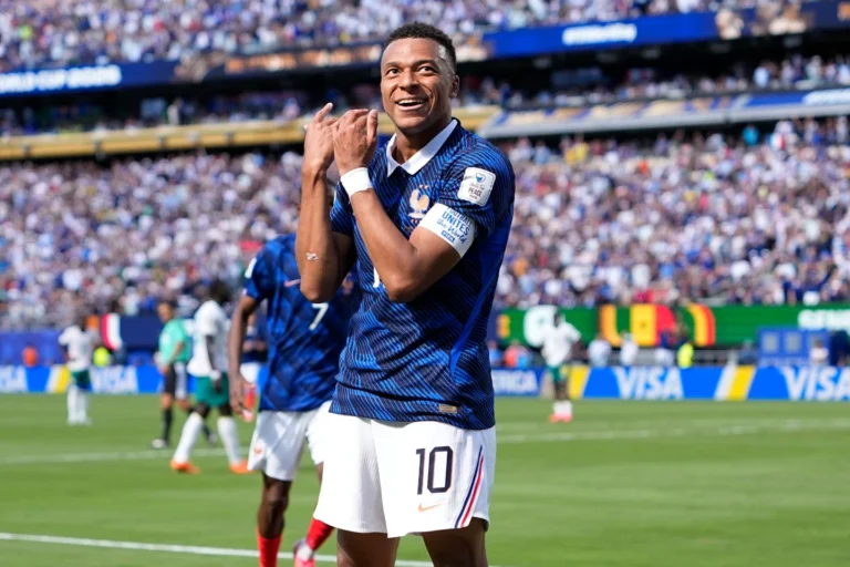(France's Kylian Mbappe celebrates after scoring the opening goal of his team during the World Cup Group I soccer match between France and Senegal in East Rutherford, N.J., near New York, Tuesday, June 16, 2026. AP Photo: Frank Franklin II)