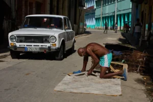 (A man repairs a mattress in Havana, Cuba, Tuesday, June 9, 2026.  AP Photo: Ramon Espinosa)