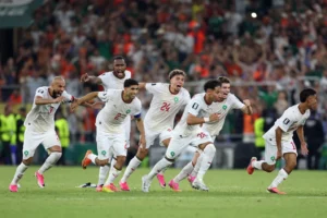 (The Moroccan team starts to celebrate after winning on penalty kicks the World Cup round of 32 soccer match between the Netherlands and Morocco in Guadalupe, near Monterrey, Mexico, Monday, June 29, 2026.  AP Photo: Sofia Yaker)