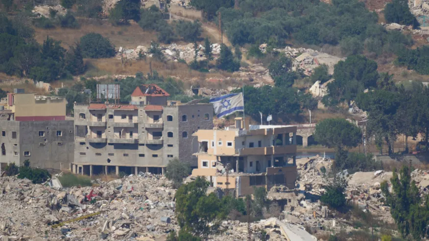 (An Israeli flag tops a destroyed building in southern Lebanon, as seen from northern Israel, Sunday, June 28, 2026. AP Photo: Ohad Zwigenberg)