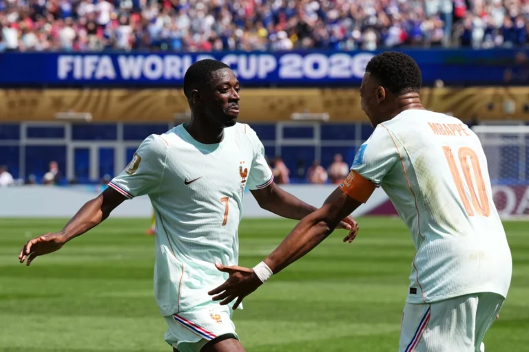 (France's Ousmane Dembele celebrates with Kylian Mbappe, right, after scoring his side's third goal during the World Cup Group I soccer match between Norway and France in Foxborough, Mass., near Boston, Friday, June 26, 2026. Credit: AP Photo: Martin Meissner)
