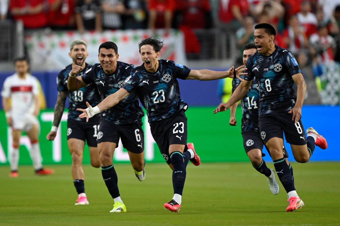 (Paraguay’s Matias Galarza (23) celebrates with Junior Alonso (6) and Diego Gomez (8) after scoring their opening goal during the World Cup Group D soccer match between Turkey and Paraguay in Santa Clara, Calif., near San Francisco, Friday, June 19, 2026.  AP Photo: Eakin Howard)