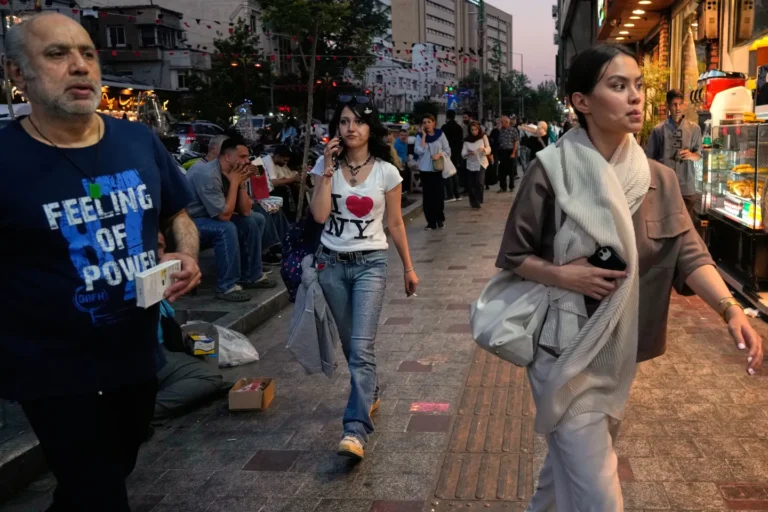 (People walk along Tajrish square in northern Tehran, Monday, June 15, 2026.  AP Photo: Vahid Salemi)