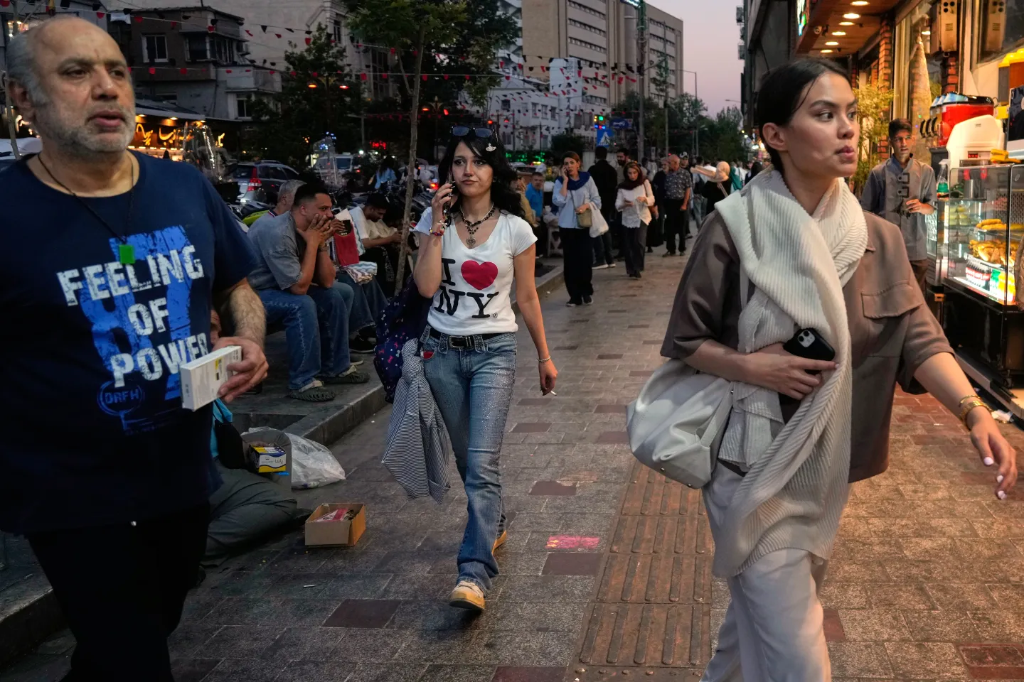 (People walk along Tajrish square in northern Tehran, Monday, June 15, 2026.  AP Photo: Vahid Salemi)