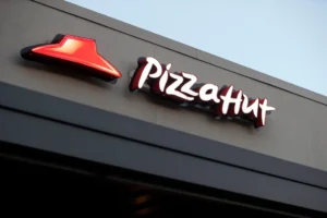 (This Dec. 15, 2016, file photo shows a Pizza Hut restaurant in New Orleans. (AP Photo/Gerald Herbert, File)