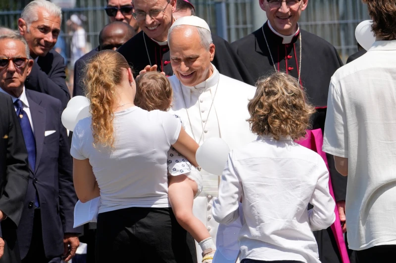 (Pope Leo XIV is greeted as he arrives at Pavia, northern Italy, Saturday, June 20, 2026.  AP Photo: Luca Bruno)