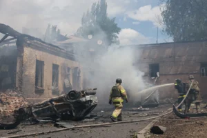 (Rescue workers put out a fire at a building destroyed after a Russian strike on Zaporizhzhia, Ukraine, on Friday, June 26, 2026. AP Photo: Evgeniy Maloletka)