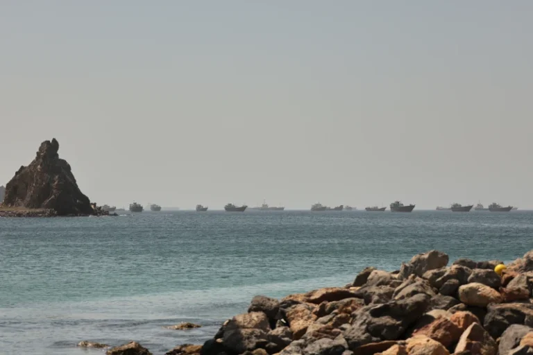 (Tankers and cargo vessels are seen in the Gulf of Oman, along shipping routes linking the Strait of Hormuz and the Arabian Sea, Tuesday, June 16, 2026.  AP Photo)
