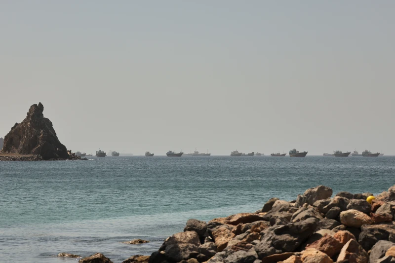(Tankers and cargo vessels are seen in the Gulf of Oman, along shipping routes linking the Strait of Hormuz and the Arabian Sea, Tuesday, June 16, 2026.  AP Photo)