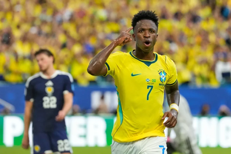 (Brazil's Vinicius Junior celebrates after scoring against Scotland. Photo: AP)