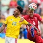 (Colombia's Luis Surez, left, and Switzerland's Nico Elvedi battle for the ball during the World Cup round of 16 soccer match between Switzerland and Colombia in Vancouver, British Columbia, Tuesday, July 7, 2026.  AP Photo: Lindsey Wasson)