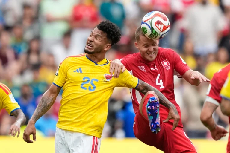 (Colombia's Luis Surez, left, and Switzerland's Nico Elvedi battle for the ball during the World Cup round of 16 soccer match between Switzerland and Colombia in Vancouver, British Columbia, Tuesday, July 7, 2026.  AP Photo: Lindsey Wasson)