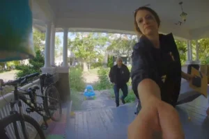 (This photo provided by David Streever shows federal officers at David Streever's home in Rochester, N.Y. in June 2026. David Streever via AP)