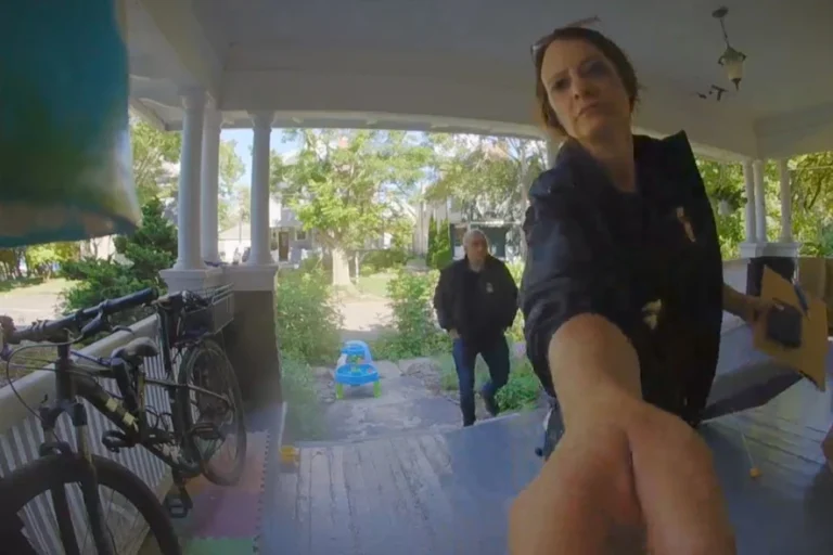 (This photo provided by David Streever shows federal officers at David Streever's home in Rochester, N.Y. in June 2026. David Streever via AP)
