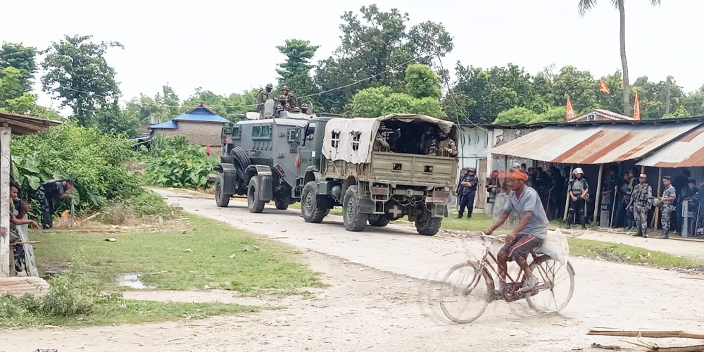 (The District Police Office, Sunsari, has stated that the situation following the incident in Dewanganj, Sunsari, is returning to normal. However, an army armored vehicle is currently announcing the curfew order. Photo: Nepal Police.)