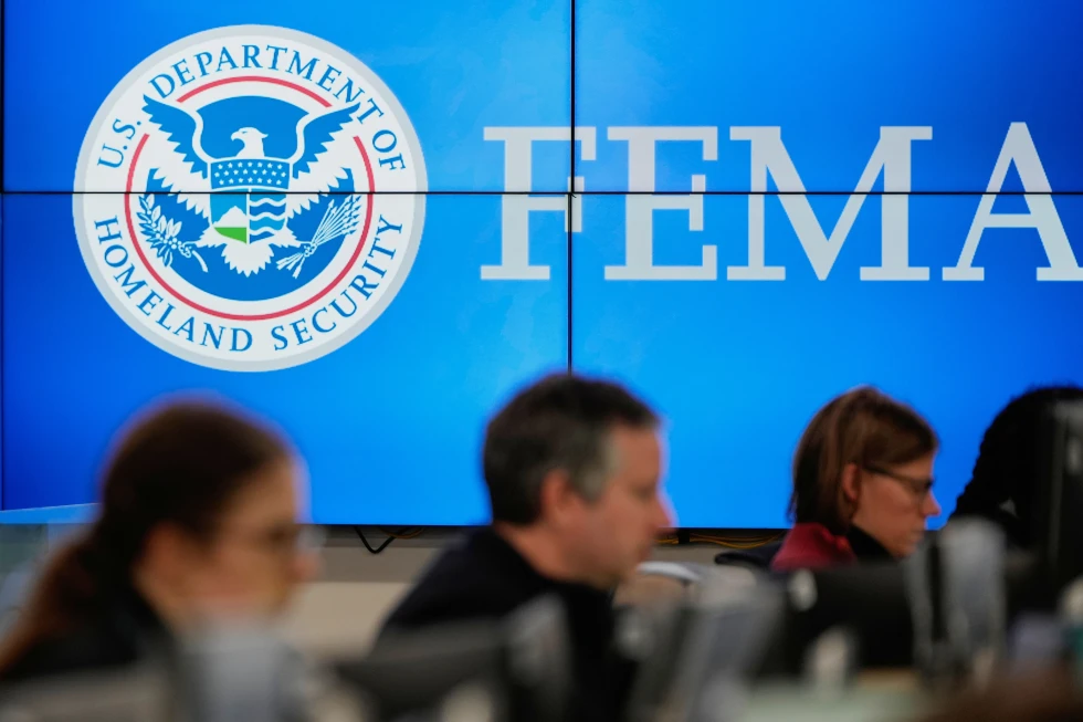 (People work at the Federal Emergency Management Agency headquarters in Washington, Jan. 24, 2026.  AP File Photo: Julia Demaree Nikhinson)