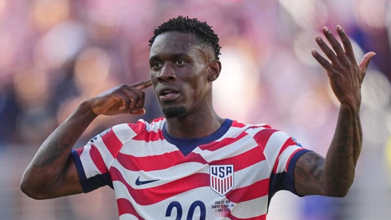 (United States' Folarin Balogun (20) reacts after scoring his team's first goal during the World Cup round of 32 soccer match between the United States and Bosnia in Santa Clara, Calif., near San Francisco, Wednesday, July 1, 2026. AP Photo: Julio Cortez)