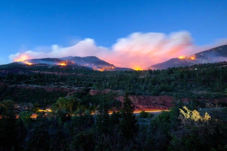 (Firefighters drive along Highway 550 as they try to access the Gold Mountain Fire on the town line of Ouray and Ridgeway, Colo., on Sunday, June 28, 2026. Photo: Michael Seamans-The Gazette via AP)