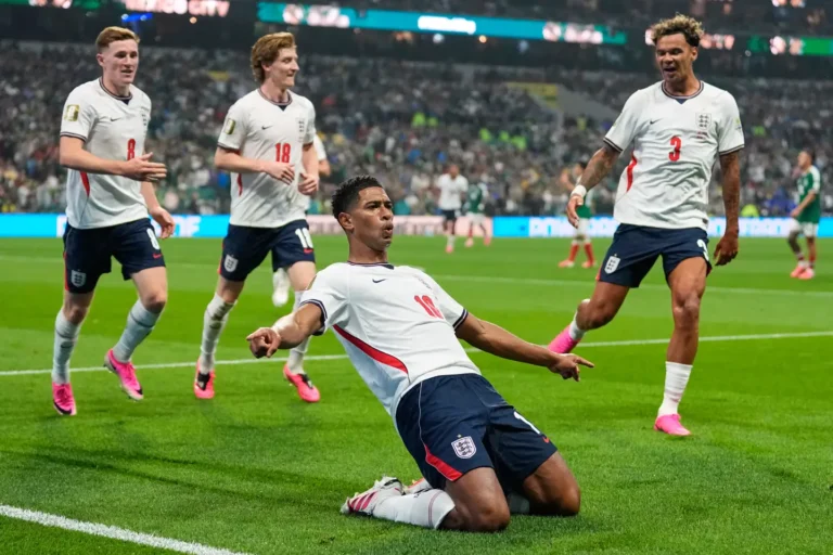 (England’s Jude Bellingham (10) celebrates with teammates after scoring his second goal during the World Cup round of 16 soccer match between Mexico and England in Mexico City, Sunday, July 5, 2026.  AP Photo: Natacha Pisarenko)