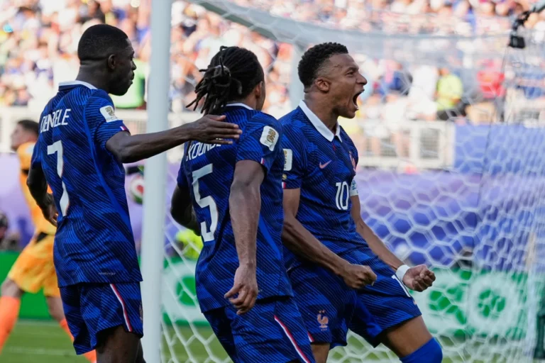 (France's Kylian Mbappe celebrates after scoring from the penalty spot the opening goal during the World Cup round of 16 soccer match between Paraguay and France in Philadelphia, Saturday, July 4, 2026.  AP Photo: Matt Slocum)