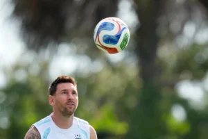(Argentina's Lionel Messi looks at the ball during a training session on the eve of the team's World Cup Round of 32 match against Cape Verde in Fort Lauderdale, Florida, on Thursday, July 2, 2026. AP Photo: Rebecca Blackwell)
