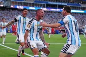 (Argentina’s Alexis Mac Allister, center, celebrates scoring their first goal with Lionel Messi during the World Cup quarterfinal soccer match between Argentina and Switzerland in Kansas City, Mo., Saturday, July 11, 2026. AP Photo: Abbie Parr)