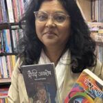 (US-based author Neelam Karki with her works. Photo: Neelam Karki's Facebook.)