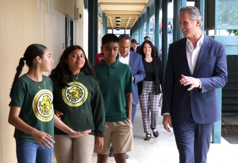 (Governor Gavin Newsom with students at Clinton Elementary School in Compton on June 5, 2025, to announce support for literacy through the Golden State Literacy Plan. Photo Curtsy: Getty Images, Genaro Molina)
