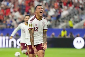 (Spain’s Pedro Porro reacts after scoring his side’s second goal during the World Cup semifinal soccer match between France and Spain in Arlington, Texas, near Dallas, Tuesday, July 14, 2026.  AP Photo: Ashley Landis)