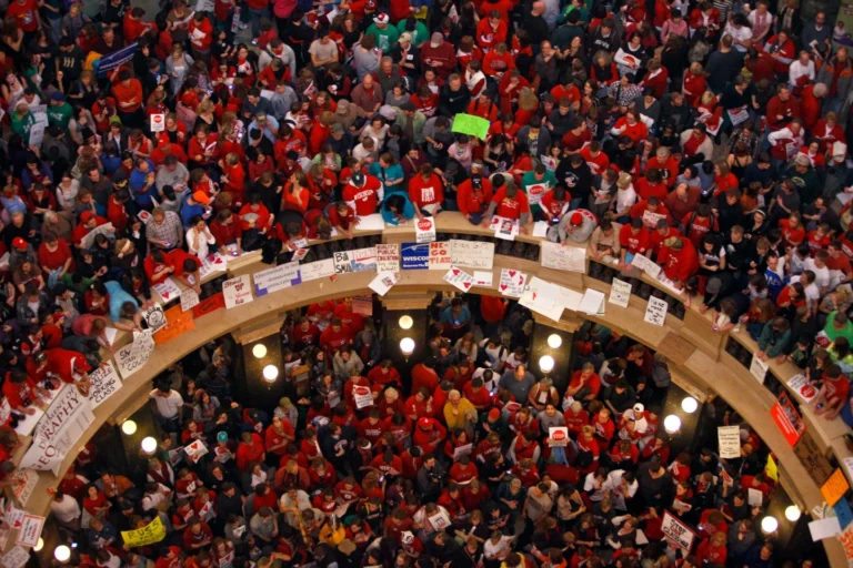 (Protesters of Wisconsin Gov. Scott Walker's bill to eliminate collective bargaining rights for many state workers pack the rotunda at the State Capitol Feb. 17, 2011, in Madison, Wis.  AP Photo: Andy Manis)