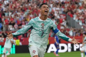 (Portugal's Cristiano Ronaldo (7) celebrates after scoring their opening goal during the World Cup round of 32 soccer match between Portugal and Croatia in Toronto, Thursday, July 2, 2026.  AP Photo: Stephanie Scarbrough)