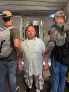 (To Lu Wang being deported. Photo: ICE)