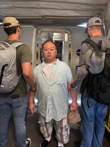  (To Lu Wang being deported. Photo: ICE)