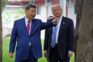 (President Donald Trump talks with China’s President Xi Jinping at the Zhongnanhai leadership compound, May 15, 2026, in Beijing. (AP File Photo/Mark Schiefelbein, Pool)
