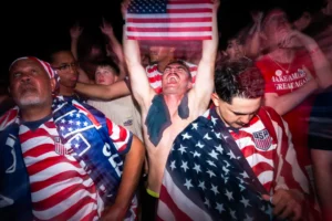 (People attend a watch party for a World Cup soccer match between the United States and Bosnia Wednesday, July 1, 2026, in Washington, at the FIFA Fan Zone on the National Mall.  AP Photo: Allison Robbert)